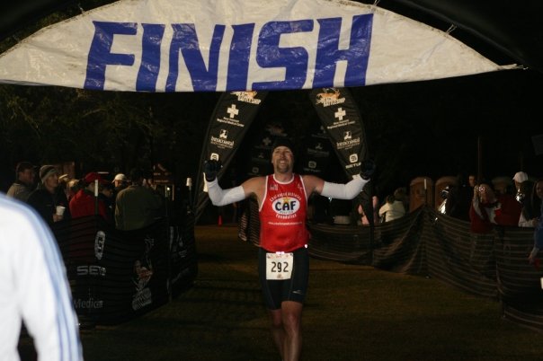 Crossing the Finish Line at the Beach2Battleship Ironman Triathlon