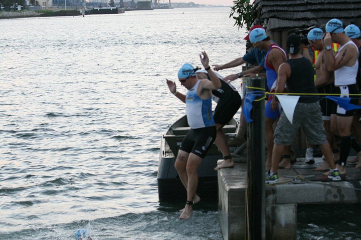 Getting pushed into the swim start area.
