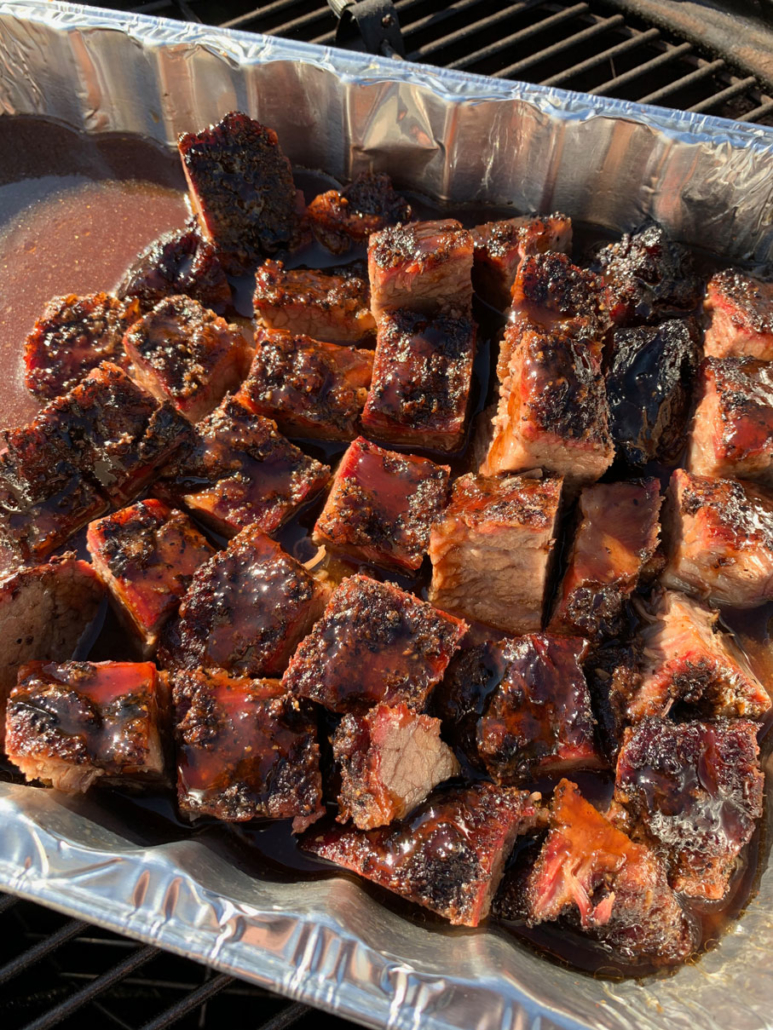 Final coat of sauce on the burnt ends