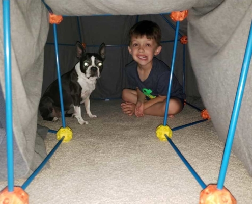 Olive and Brian in his fort one day