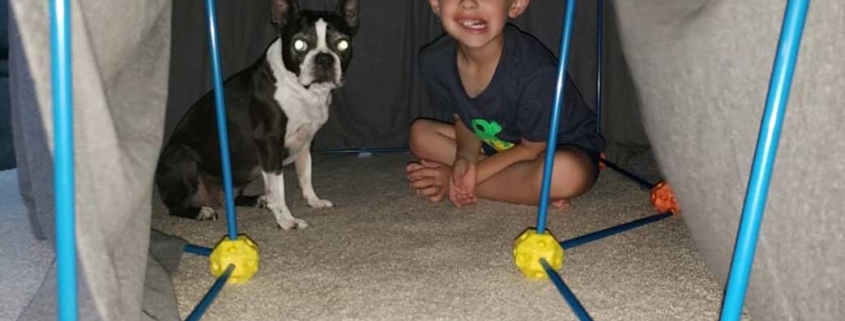 Olive and Brian in his fort one day