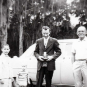 2022-09-17-00-grandpa-photo-camera My grandfather holding a camera with his brother-in-law, c. 1959