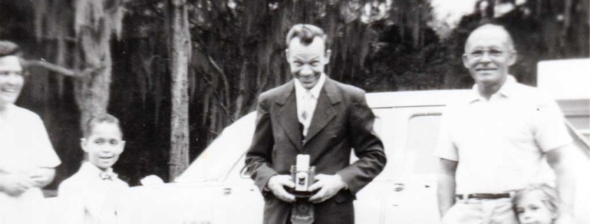 My grandfather holding a camera with his brother-in-law, c. 1959